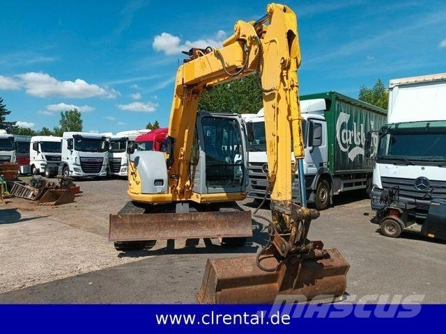 New Holland E70SR 4 Екскаватори-навантажувачі