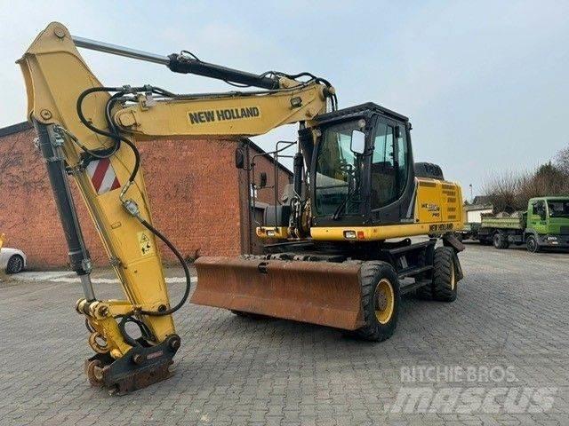 New Holland WE210 Колісні екскаватори