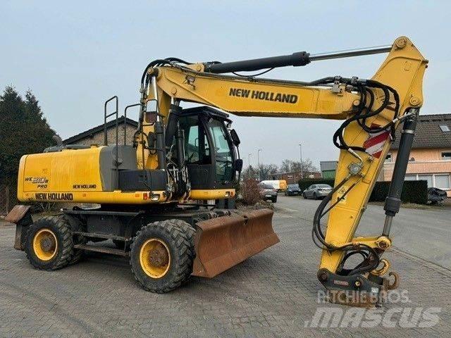 New Holland WE210 Колісні екскаватори