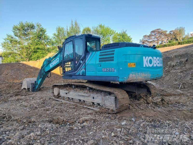 Kobelco SK210 Гусеничні екскаватори
