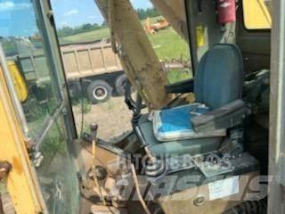 CAT 245 Гусеничні екскаватори