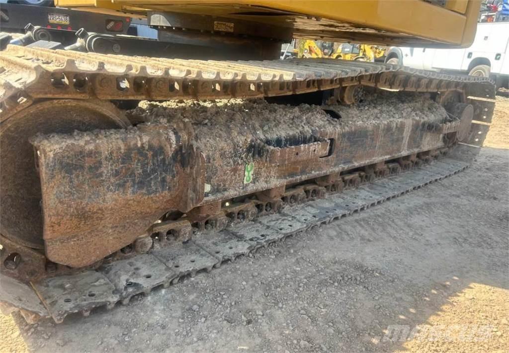 CAT 310 Гусеничні екскаватори