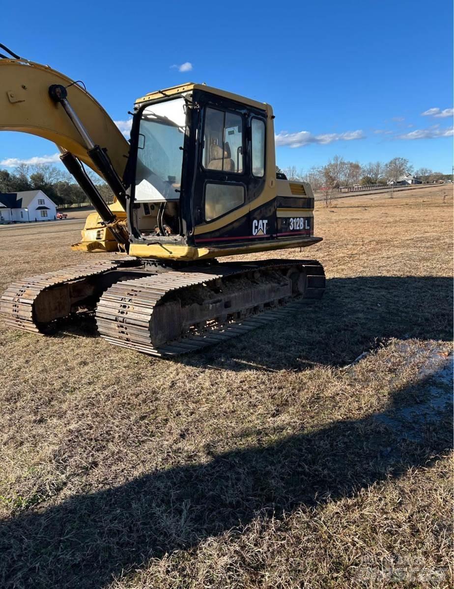 CAT 312BL Гусеничні екскаватори
