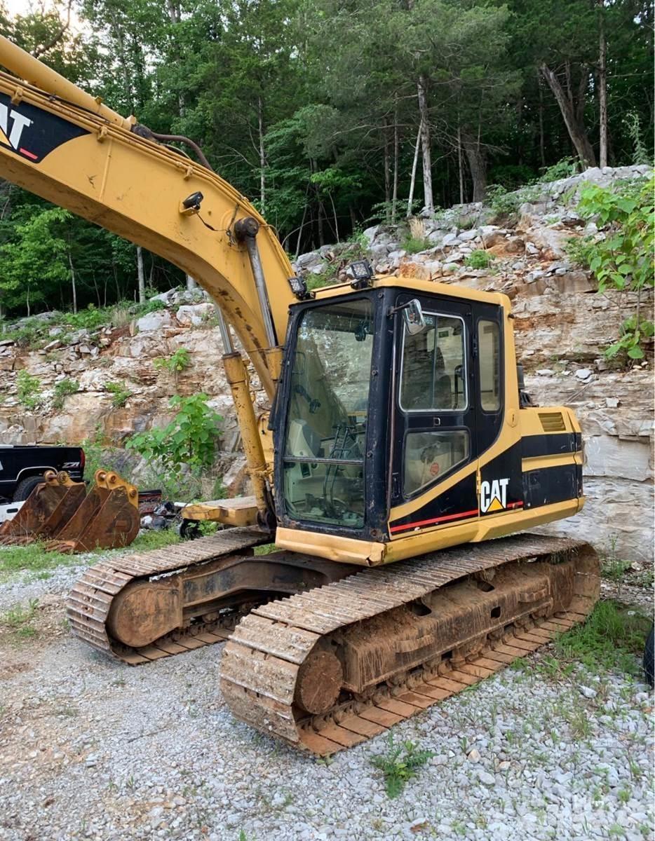 CAT 312BL Гусеничні екскаватори
