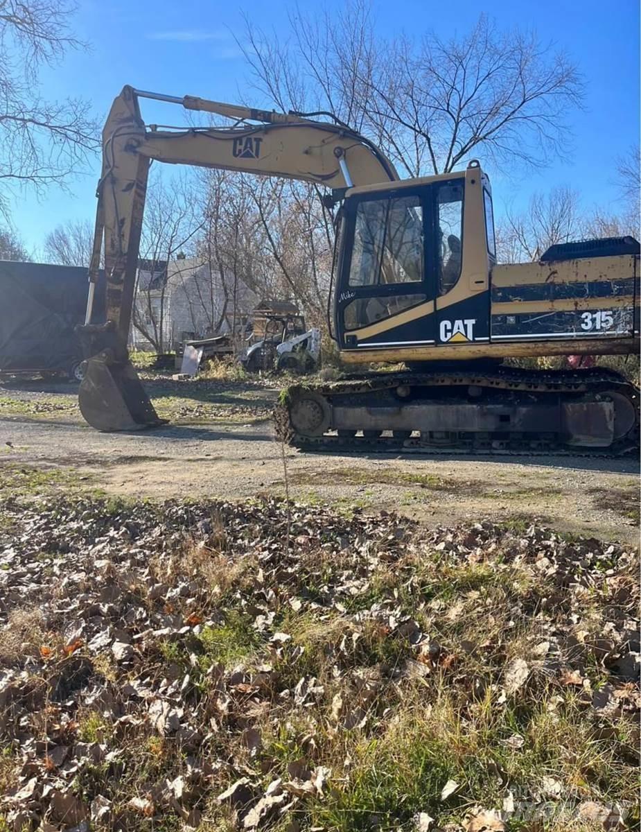 CAT 315 Гусеничні екскаватори