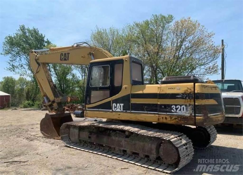 CAT 320L Гусеничні екскаватори