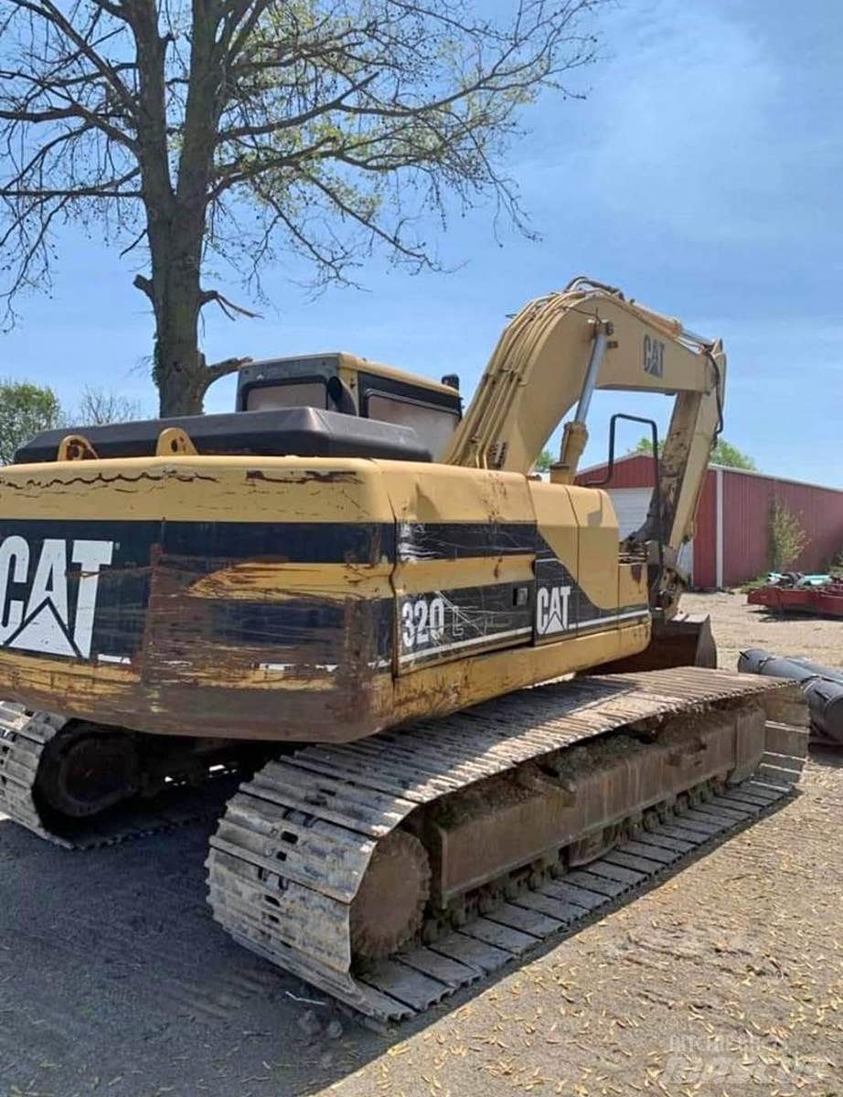 CAT 320L Гусеничні екскаватори