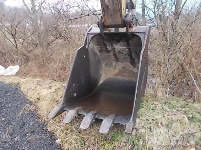 CAT 322L Гусеничні екскаватори