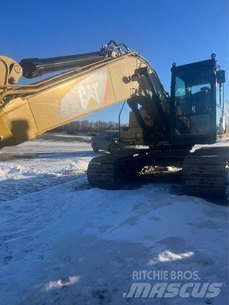 CAT 323FL Гусеничні екскаватори
