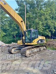 CAT 324DL Екскаватори з великим вилітом