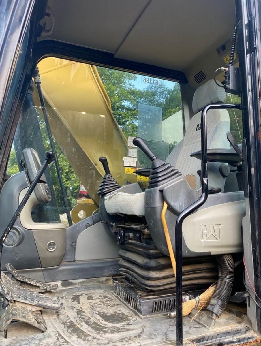CAT 324DL Екскаватори з великим вилітом