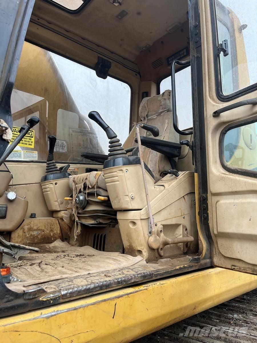 CAT 325 Гусеничні екскаватори