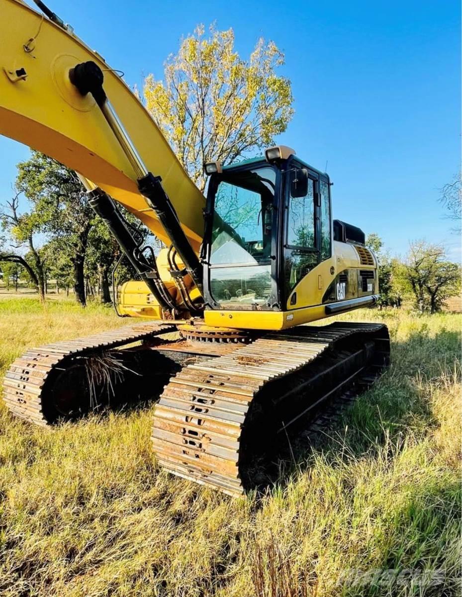 CAT 330DL Гусеничні екскаватори