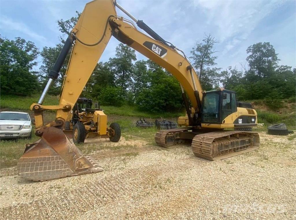 CAT 330DL Гусеничні екскаватори
