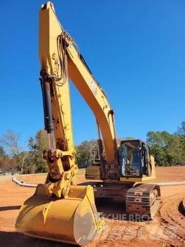 CAT 340 Гусеничні екскаватори