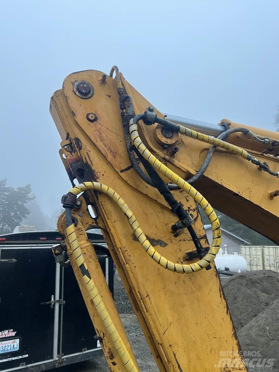 CAT 416 Екскаватори-навантажувачі