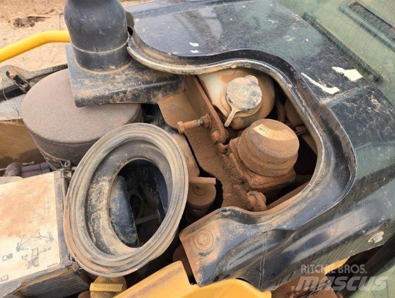 CAT 416E Екскаватори-навантажувачі