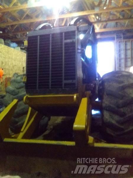 CAT 525C Трельовочні трактора