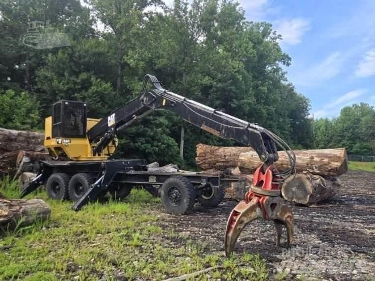 CAT 559C Лісонавантажувачі