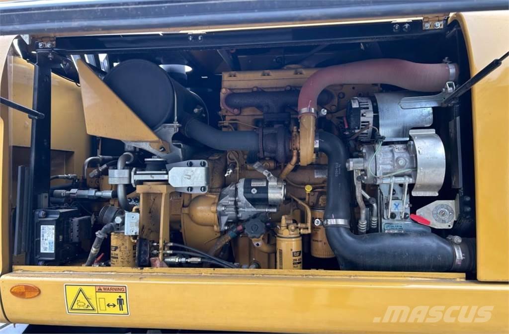 CAT M313D Колісні екскаватори