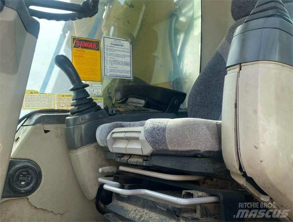 CAT M316C Колісні екскаватори