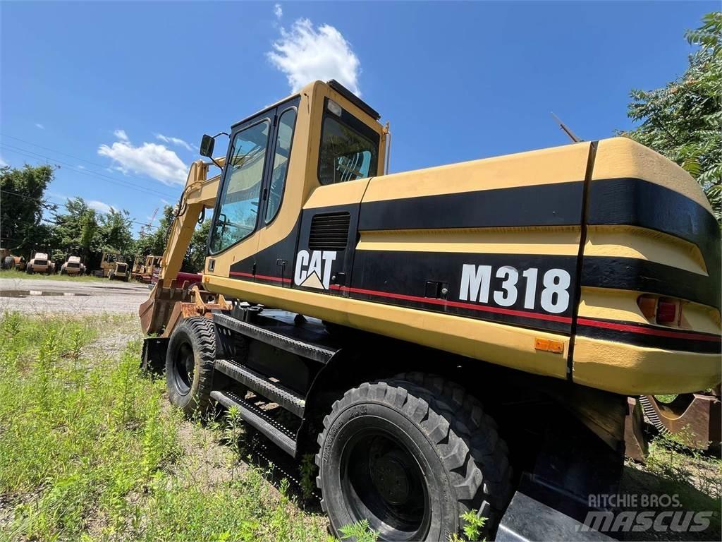 CAT M318 Колісні екскаватори