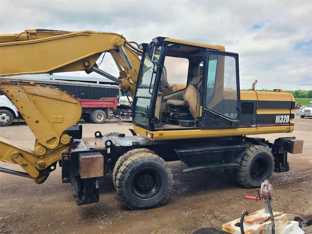 CAT M320 Колісні екскаватори