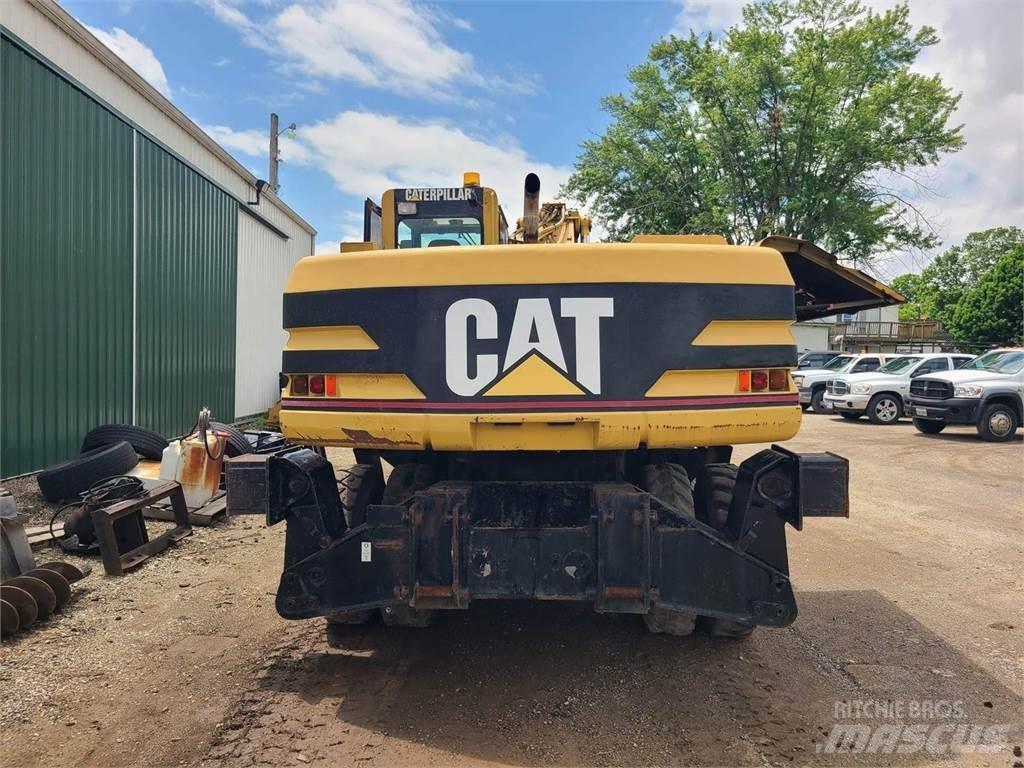 CAT M320 Колісні екскаватори