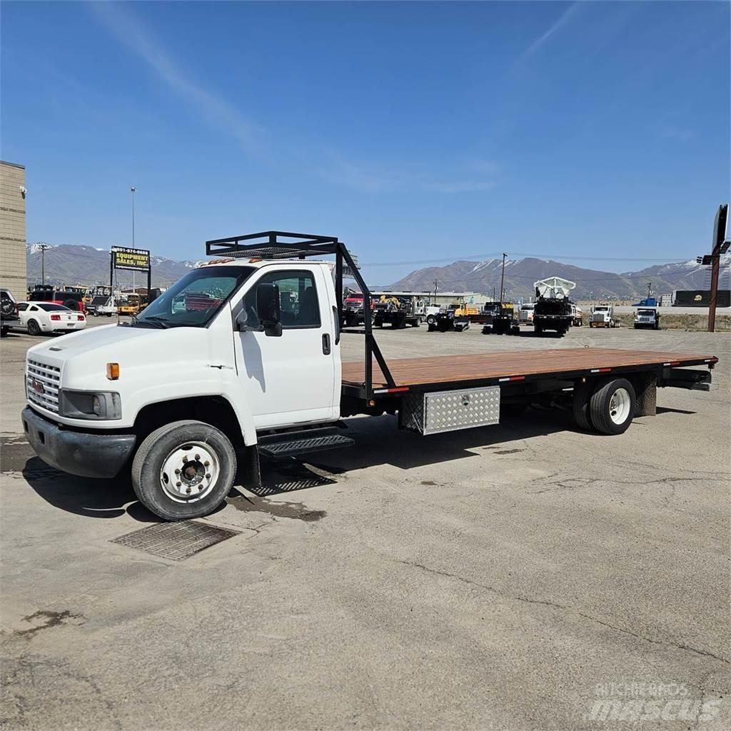GMC C5500 Вантажівки-платформи/бокове розвантаження