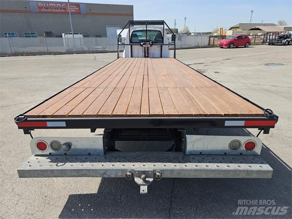 GMC C5500 Вантажівки-платформи/бокове розвантаження