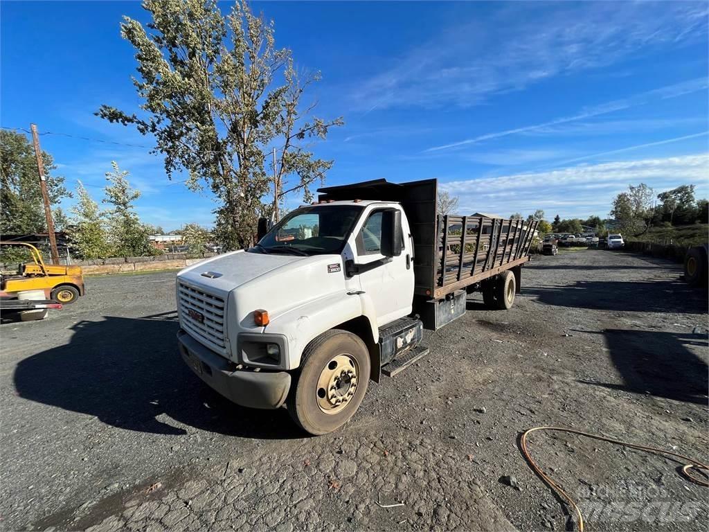 GMC C6500 Вантажівки-платформи/бокове розвантаження