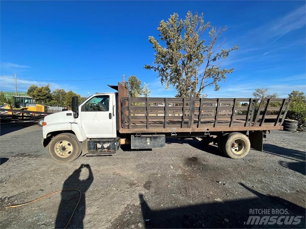 GMC C6500 Вантажівки-платформи/бокове розвантаження