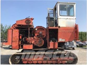 Madill 122 Крани-навантажувачі