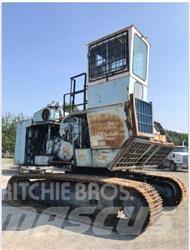 Madill 122 Крани-навантажувачі