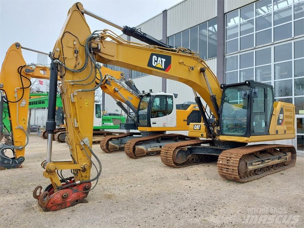 CAT 323 Гусеничні екскаватори