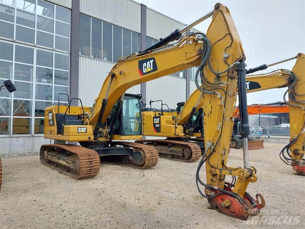 CAT 323 Гусеничні екскаватори
