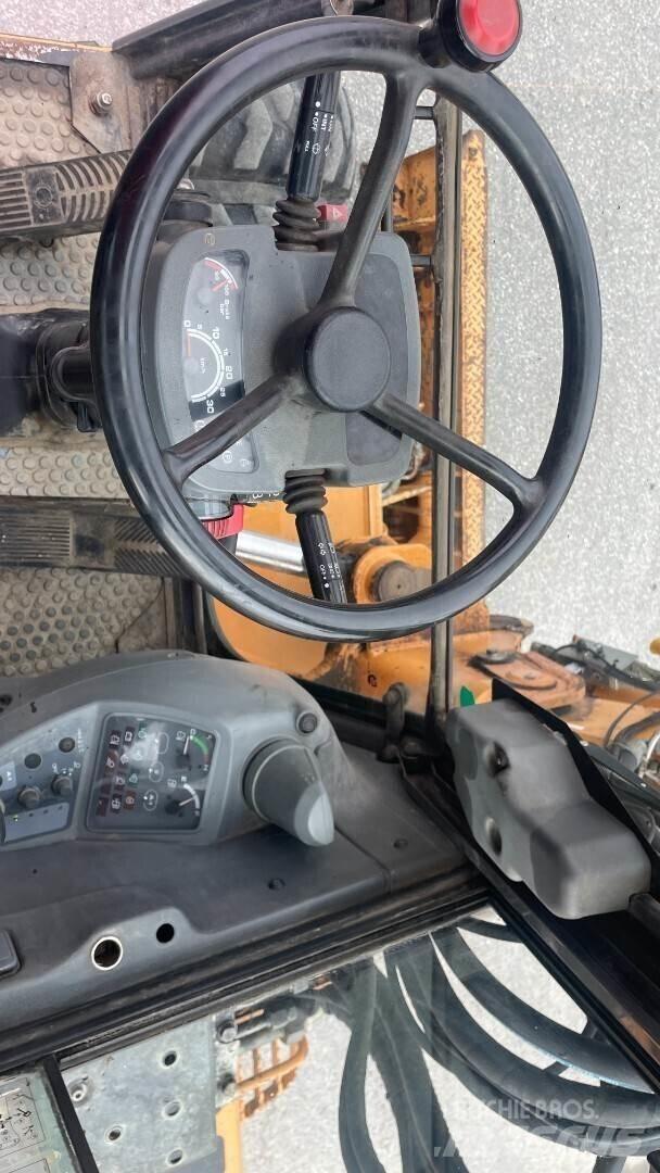 CASE WX90 Колісні екскаватори
