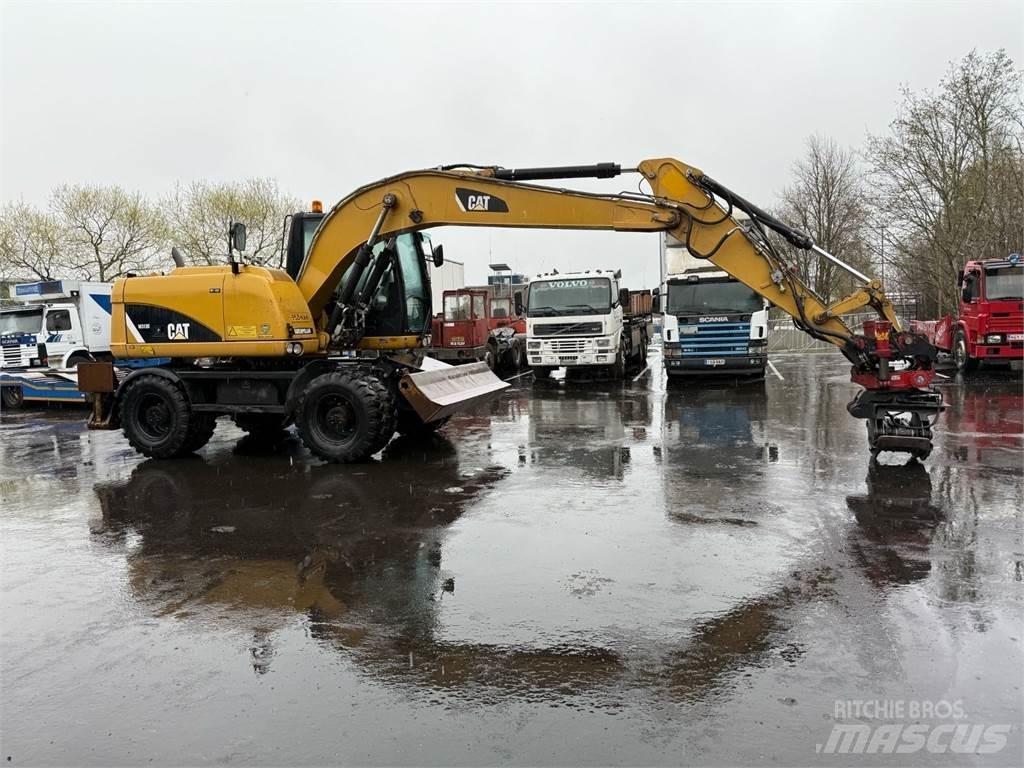 CAT M313 D Колісні екскаватори