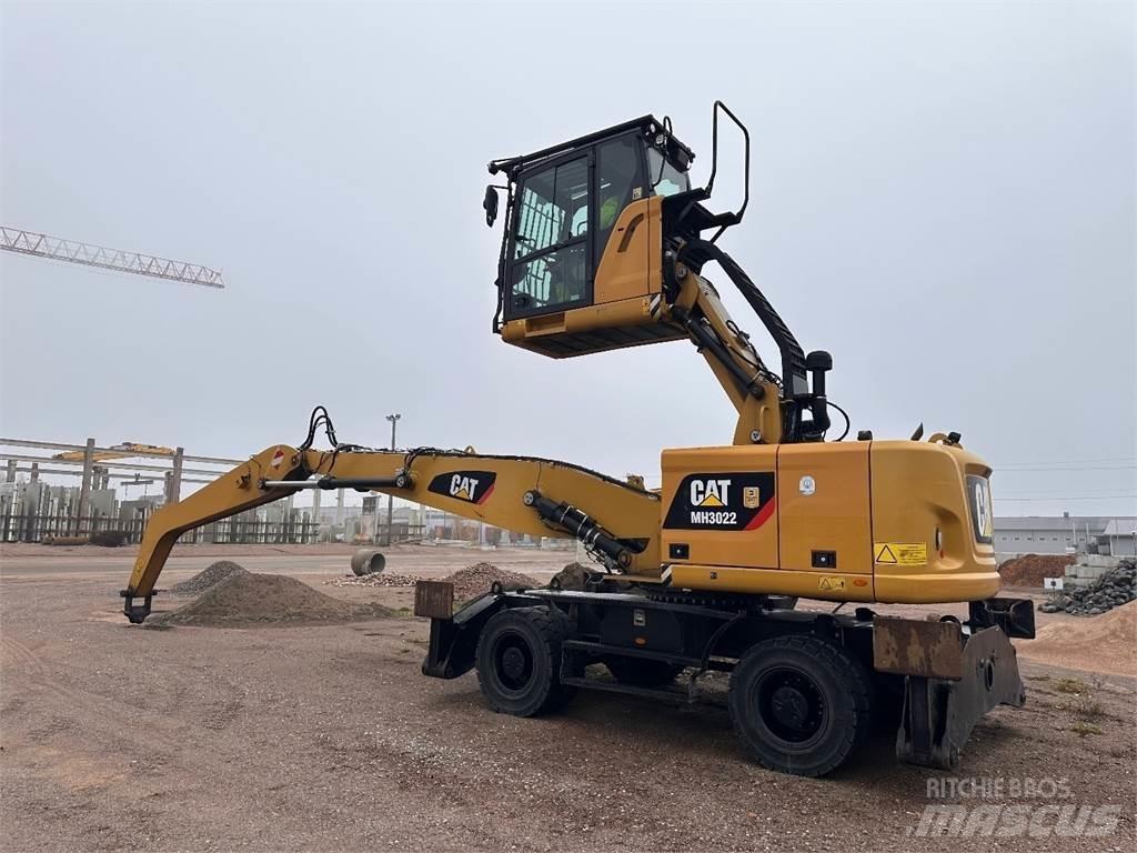 CAT MH3022 Колісні екскаватори