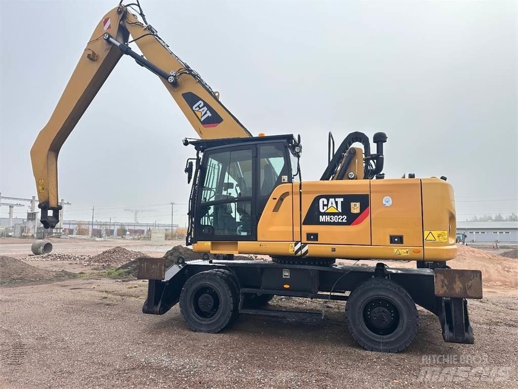 CAT MH3022 Колісні екскаватори
