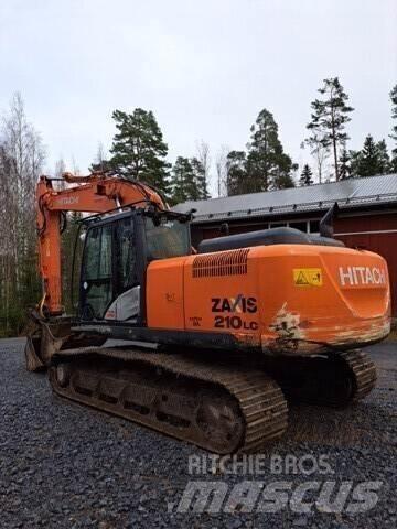 Hitachi Zaxis 210 Гусеничні екскаватори