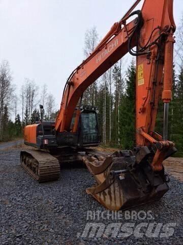 Hitachi Zaxis 210 Гусеничні екскаватори