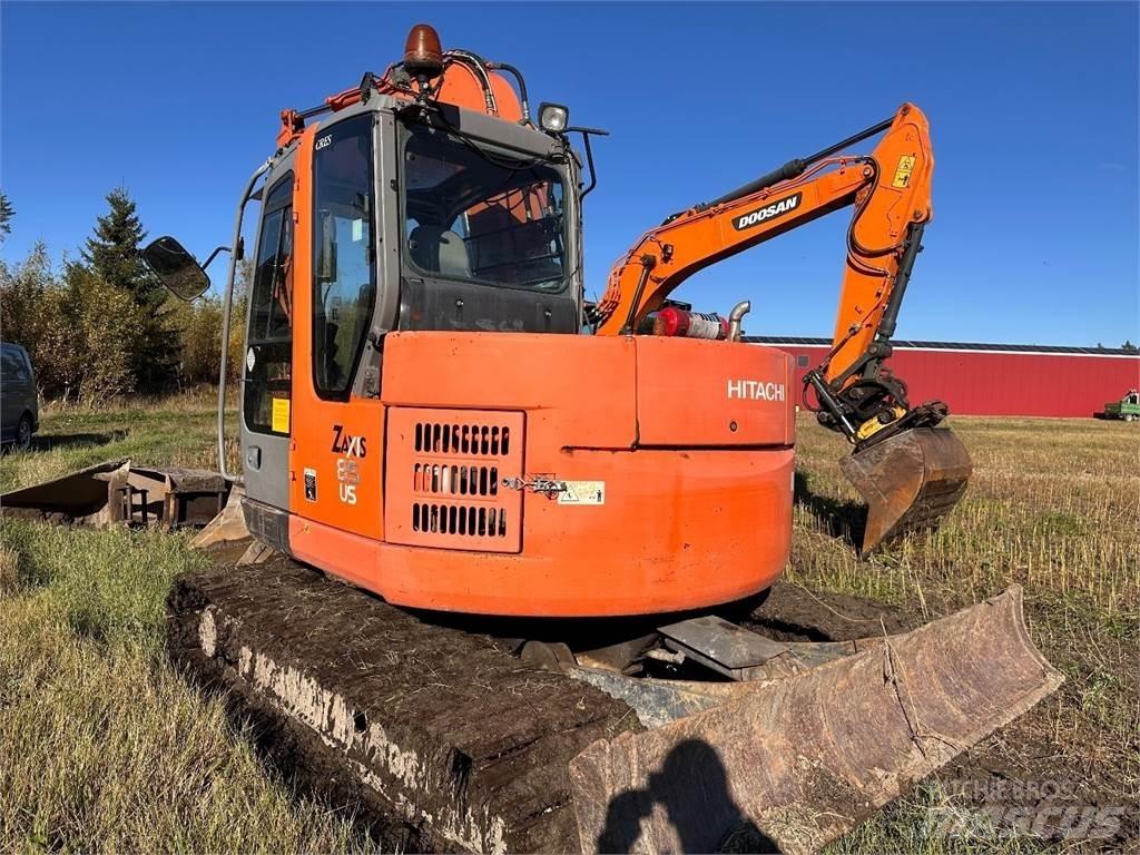Hitachi ZX85 US Середні екскаватори 7т. - 12т.