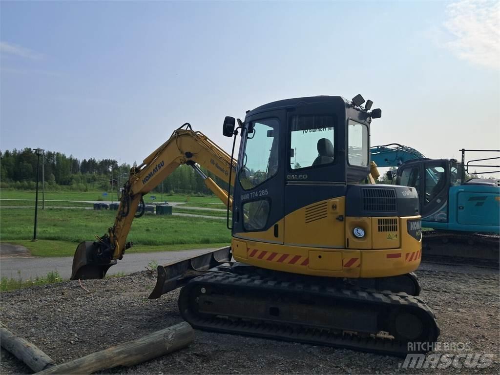 Komatsu Pc78 Середні екскаватори 7т. - 12т.
