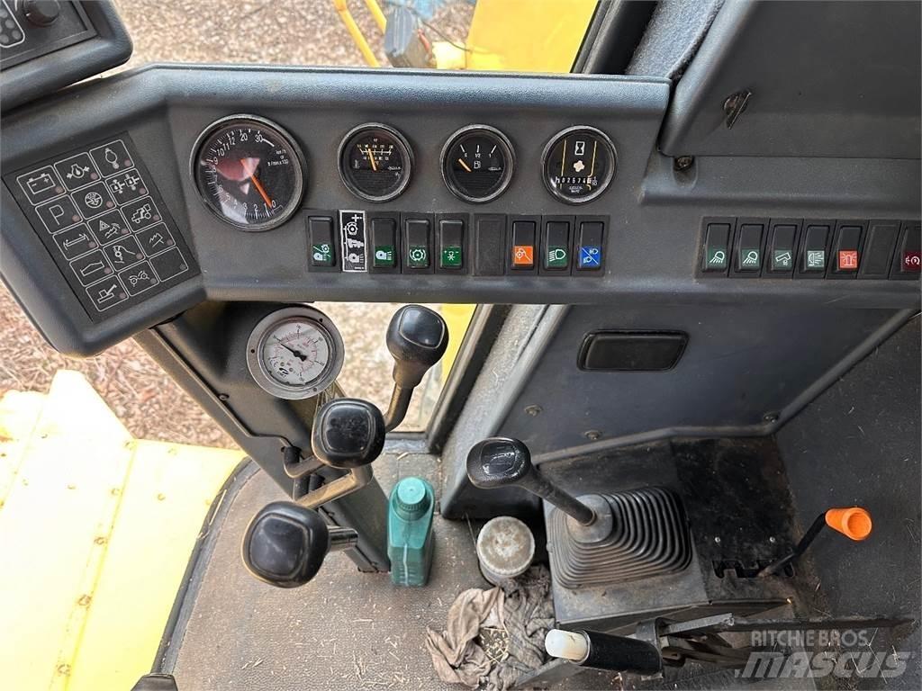 New Holland TC56 Зернозбиральні комбайни