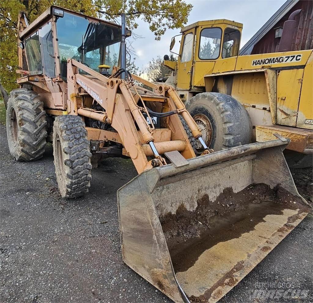 Valtra C 912M-4 Екскаватори-навантажувачі