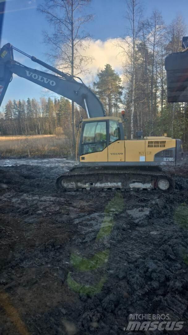 Volvo 210C Гусеничні екскаватори