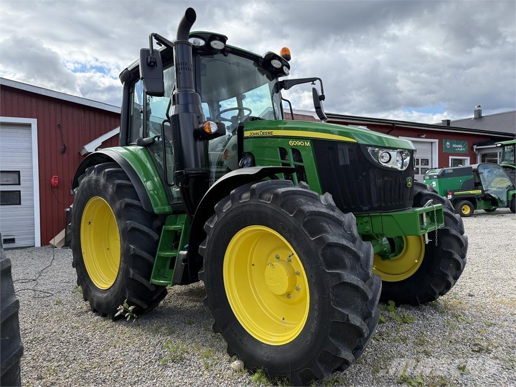 John Deere 6090M Трактори