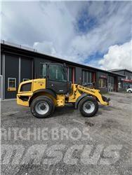 New Holland W70C Фронтальні навантажувачі