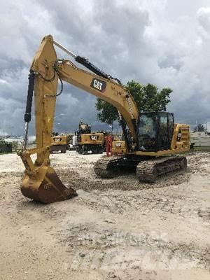 CAT 320 Гусеничні екскаватори